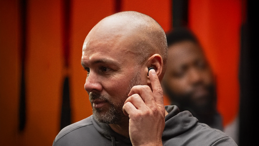 Active man working out using his hearing aids