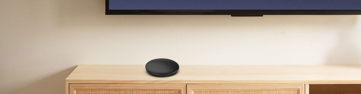 Signia TV Sound accessory next to television, designed for Signia Pure Charge&Go BCT IX hearing aids, enhancing TV audio.