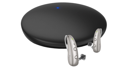 Signia TV Sound accessory for Signia Pure Charge&Go BCT IX hearing aids, showing device connected to a TV for audio streaming.